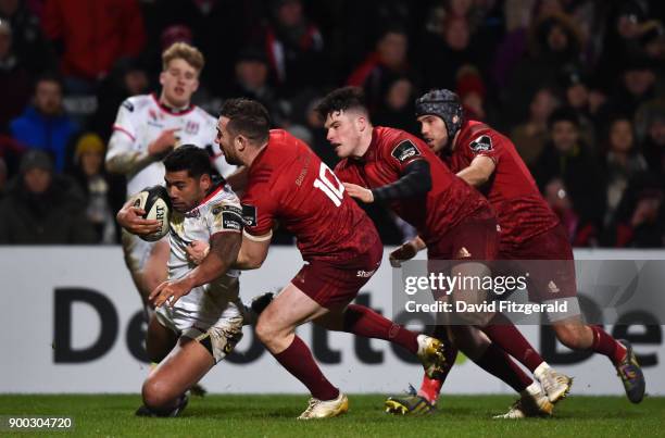 Belfast , United Kingdom - 1 January 2018; Charles Piutau of Ulster is tackled behind his own try line by JJ Hanrahan of Munster during the Guinness...