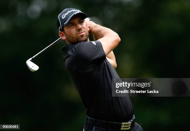 Sergio Garcia of Spain watches a tee shot during the final round of the Wyndham Championship at Sedgefield Country Club on August 23, 2009 in...