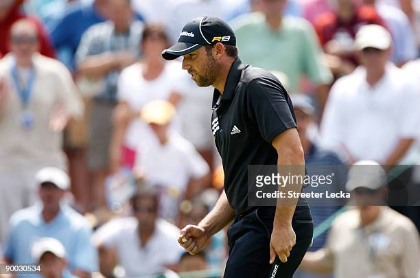 Sergio Garcia of Spain pumps his fist after a birdie on the 7th hole during the final round of the Wyndham Championship at Sedgefield Country Club on...