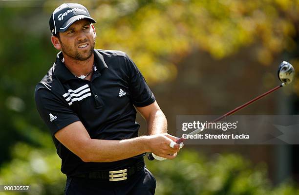 Sergio Garcia of Spain watches a tee shot during the final round of the Wyndham Championship at Sedgefield Country Club on August 23, 2009 in...