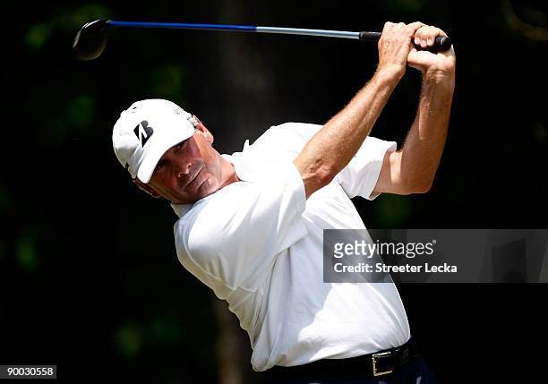 Fred Couples watches his tee shot on the 2nd hole during the final round of the Wyndham Championship at Sedgefield Country Club on August 23, 2009 in...
