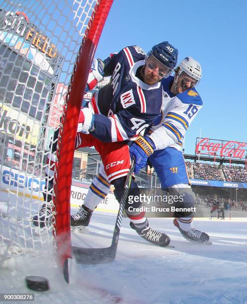 Michael Grabner of the New York Rangers scores a first-period goal against the Buffalo Sabres during the 2018 Bridgestone NHL Winter Classic at Citi...