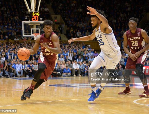 Terance Mann of the Florida State Seminoles drives against the Duke Blue Devils during their game at Cameron Indoor Stadium on December 30, 2017 in...