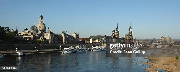 The Elbe River flows by the Frauenkirche cathedral and the Semper Oper opera house August 23, 2009 in Dresden, Germany. Dresden is becoming an...