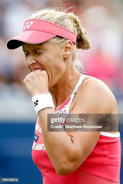 Elena Dementieva of Russia celebrates a point in the final game of the final set against Maria Sharapova of Russia during the final of the Rogers Cup...