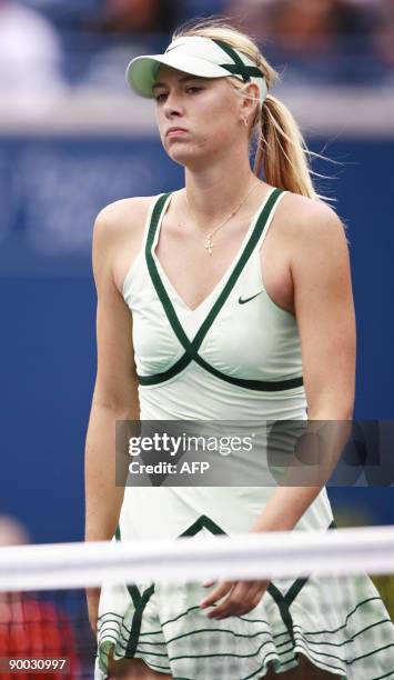 Maria Sharapova of Russia reacts to a missed shot during her loss to compatriot Elena Dementieva in the final of the Rogers Cup August 23, 2009 in...