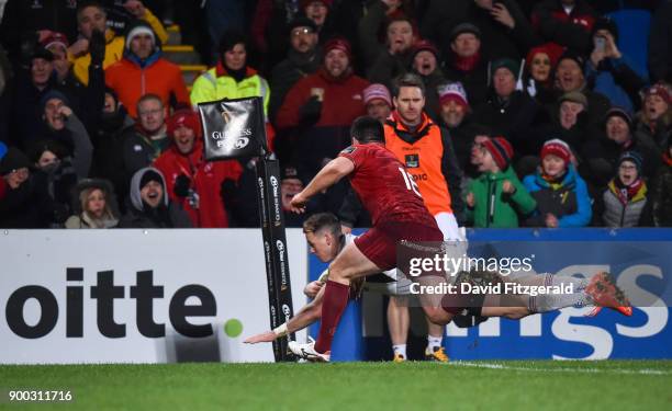 Belfast , United Kingdom - 1 January 2018; Craig Gilroy of Ulster goes over to score his side's third try during the Guinness PRO14 Round 12 match...