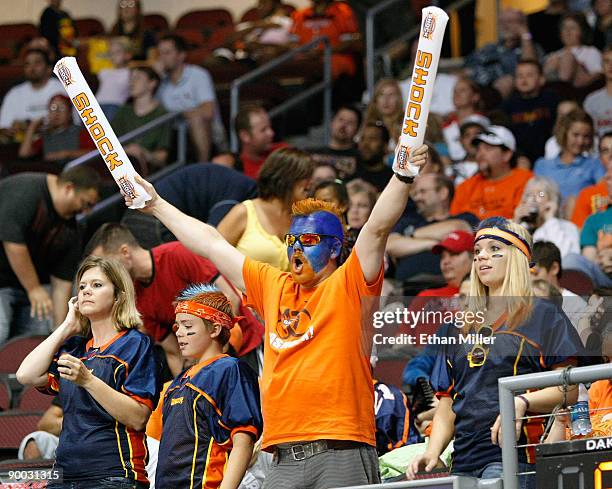 Spokane Shock fans Dakota Bauge, Dan Bauge and Danielle Bauge of Washington watch the Shock take on the Wilkes-Barre/Scranton Pioneers during the...