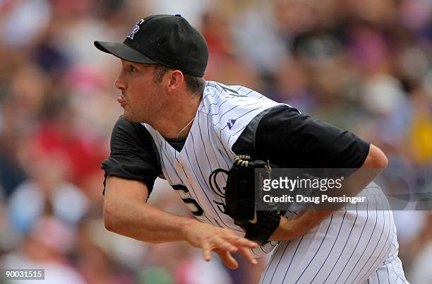 Relief pitcher Huston Street of the Colorado Rockies delivers against the San Francisco Giants at Coors Field on August 23, 2009 in Denver, Colorado....