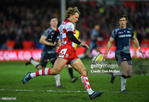 Billy Twelvetrees of Gloucester kicks clear during the Aviva Premiership match between Gloucester Rugby and Sale Sharks Sharks at Kingsholm Stadium...