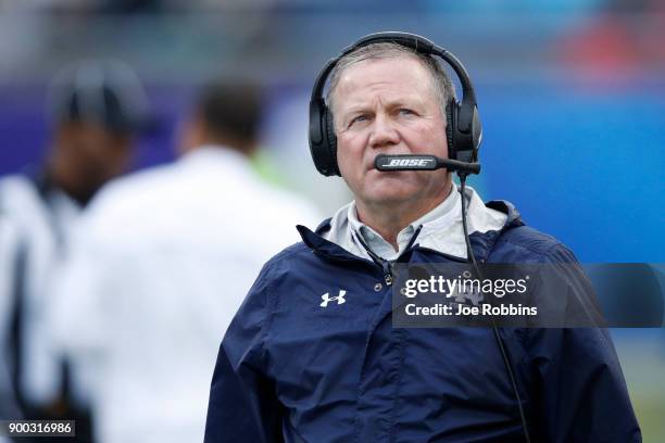 Head coach Brian Kelly of the Notre Dame Fighting Irish looks on against the LSU Tigers in the first half of the Citrus Bowl on January 1, 2018 in...