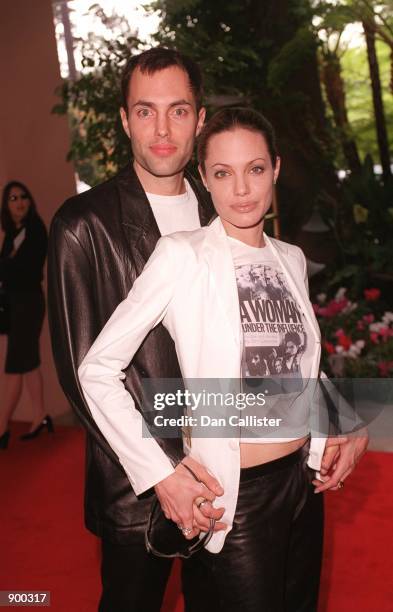 Beverly Hills, CA. Angelina Jolie and brother attend the Fifth Annual Broadcast Film Critics Association Critics'' Choice Awards Luncheon Ceremony....