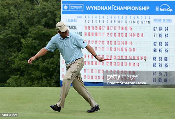Jason Bohn reacts to missing a putt on the 18th hole during the final round of the Wyndham Championship at Sedgefield Country Club on August 23, 2009...