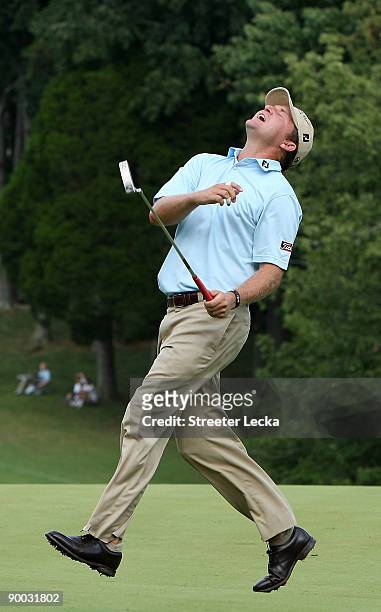 Jason Bohn reacts to missing a putt on the 18th hole during the final round of the Wyndham Championship at Sedgefield Country Club on August 23, 2009...