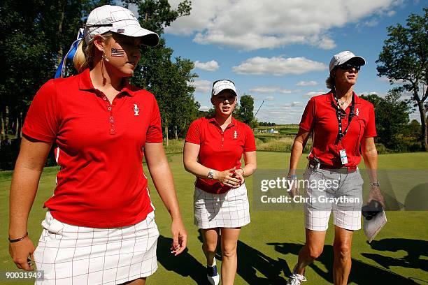 Brittany Lincicome , Morgan Pressel and team captain Beth Daniel of the U.S. Team walk on the 16th green after Pressel clinched the 2009 Solheim Cup...