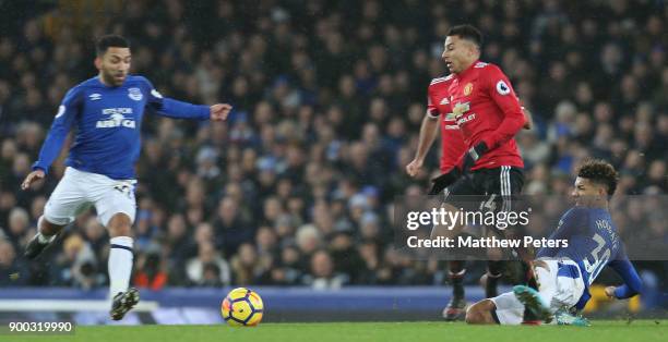 Jesse Lingard of Manchester United in action with Mason Holgate of Everton during the Premier League match between Everton and Manchester United at...