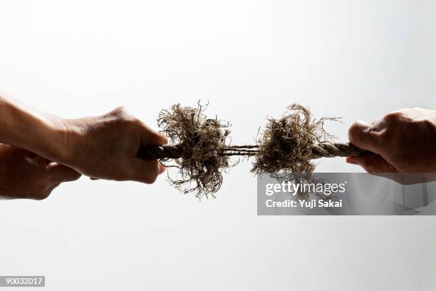 Two Hand Rope Pull Two Hands Pulling A Rope Photos and Premium High Res Pictures - Getty ...