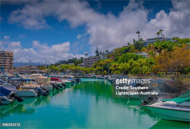 coastal view and recreational boats, city of noumea, new caledonia, south pacific. - noumea stock-fotos und bilder
