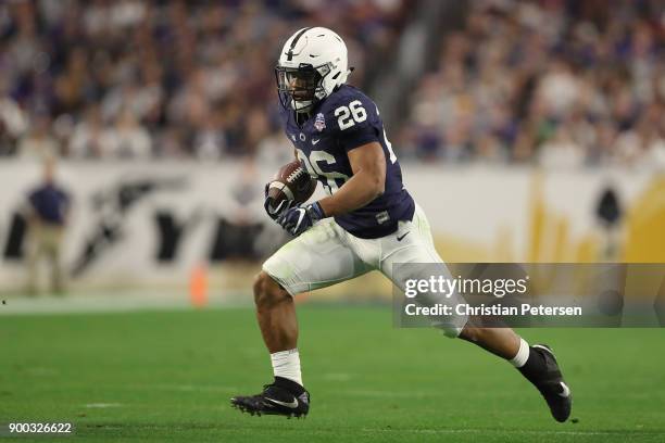 Running back Saquon Barkley of the Penn State Nittany Lions rushes the football against the Washington Huskies during the second half of the...