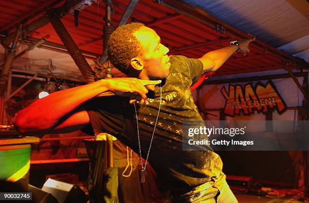 Athlete Usain Bolt of Jamaica celebrates his victories from the 12th IAAF World Championships in Berlin at the PUMA Party held at the Yaam Club on...