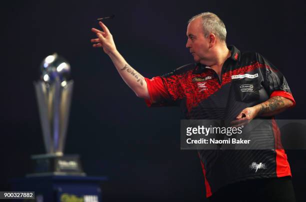 Phil Taylor of England in action during the Final against Rob Cross of England on Day Fifteen at the 2018 William Hill PDC World Darts Championships...
