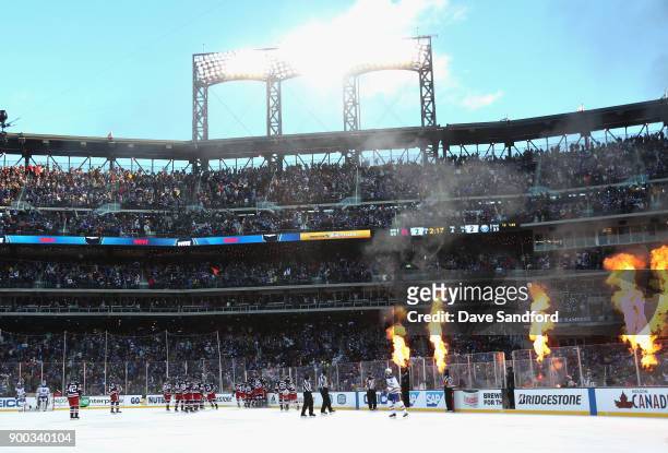 The New York Rangers celebrate winning the 2018 Bridgestone NHL Winter Classic y defeating the Buffalo Sabres 3-2 in overtime at Citi Field on...