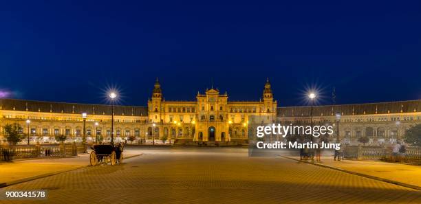illuminated plaza de espana, night scene, seville, andalusia, spain - martin sevillano fotografías e imágenes de stock