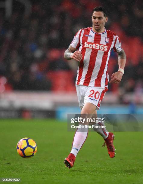 Stoke player Geoff Cameron in action during the Premier League match between Stoke City and Newcastle United at Bet365 Stadium on January 1, 2018 in...