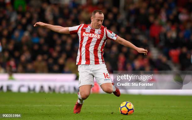 Stoke player Charlie Adam in action during the Premier League match between Stoke City and Newcastle United at Bet365 Stadium on January 1, 2018 in...