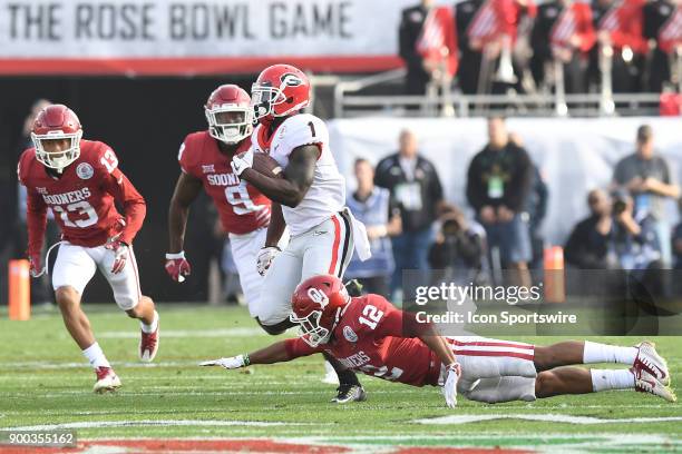 Sony Michel of the Georgia Bulldogs scores on a 75 Yd Run touchdown during during the 2nd quarter of the College Football Playoff Semifinal at the...