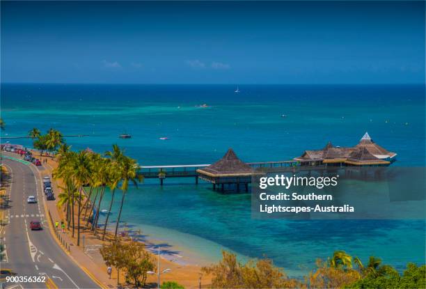 pier and restaurant facilities over the water, noumea harbour, new caledonia, south pacific. - new caledonia stock pictures, royalty-free photos & images