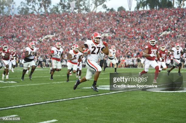 Nick Chubb of the Georgia Bulldogs scores on 50 Yd Run during the 3rd quarter of the College Football Playoff Semifinal at the Rose Bowl Game between...