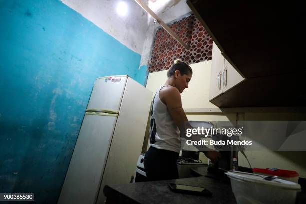 Brazilian UFC flyweight fighter Priscila "Pedrita" Cachoeira prepare your breakfast before another day of training at School of Lutas Niteroi on...