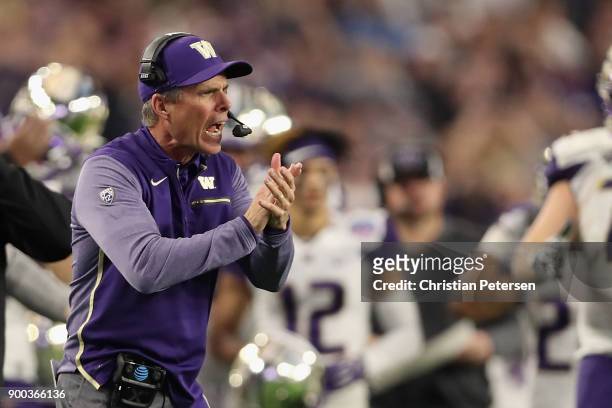 Head coach Chris Petersen of the Washington Huskies reacts during the second half of the Playstation Fiesta Bowl against the Penn State Nittany Lions...