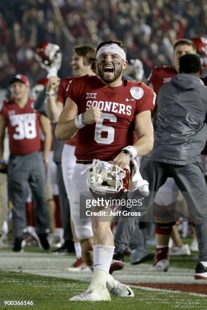 Baker Mayfield of the Oklahoma Sooners celebrates after Steven Parker of the Oklahoma Sooners scores a 46 yard touchdown because of a fumble by Sony...