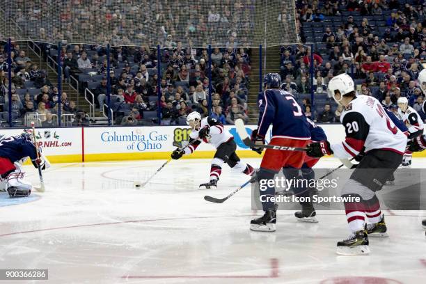 Arizona Coyotes right wing Christian Fischer attempts a shot on goal during the second period in a game between the Columbus Blue Jackets and the...