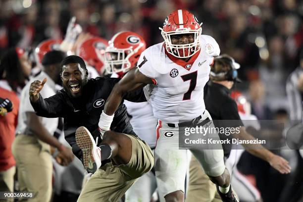 Lorenzo Carter of the Georgia Bulldogs celebrates after blocking the field goal attempt from Austin Seibert of the Oklahoma Sooners in the 2018...