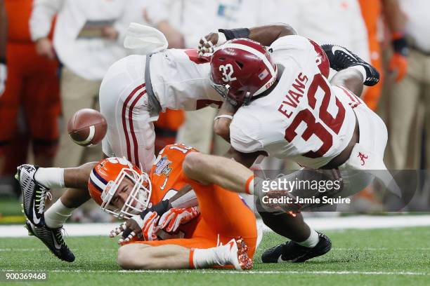 Rashaan Evans of the Alabama Crimson Tide breaks up a pass intended for Hunter Renfrow of the Clemson Tigers in the first quarter of the AllState...