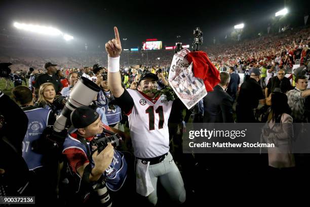 Jake Fromm of the Georgia Bulldogs celebrates after the Bulldogs beat the Oklahoma Sooners in the 2018 College Football Playoff Semifinal Game at the...