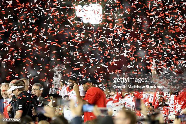 Roquan Smith of the Georgia Bulldogs celebrates after defeating the Oklahoma Sooners 54-48 in double overtime in the 2018 College Football Playoff...