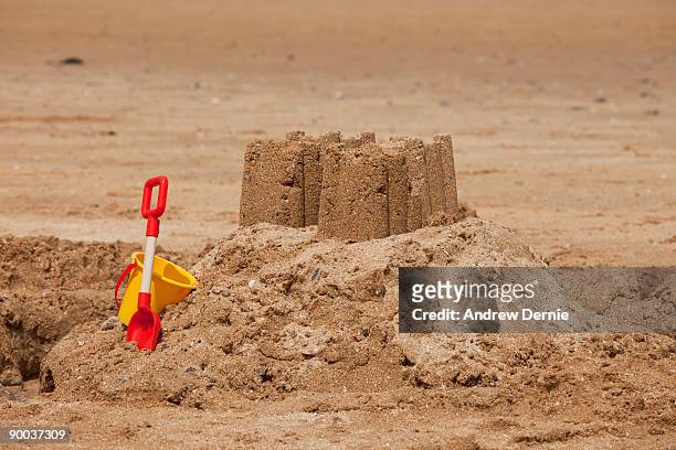 sandcastle on the beach, summer fun  - andrew dernie stock-fotos und bilder