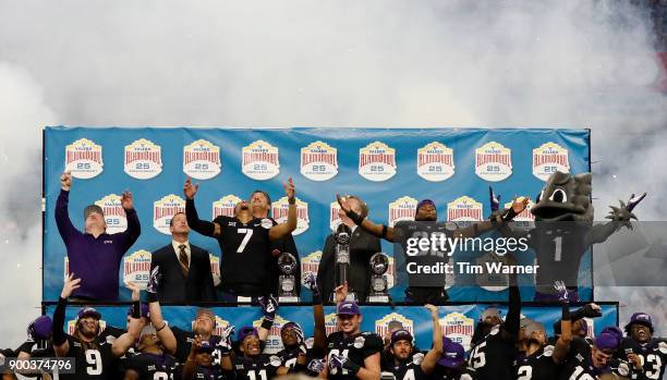 The TCU Horned Frogs celebrate at the trophy presentation after the Valero Alamo Bowl against the Stanford Cardinal at Alamodome on December 28, 2017...