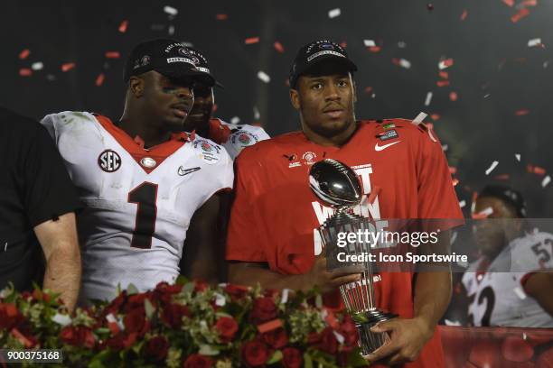 Nick Chubb of the Georgia Bulldogs with the trophy after the Bulldogs defeated the Sooners the College Football Playoff Semifinal at the Rose Bowl...