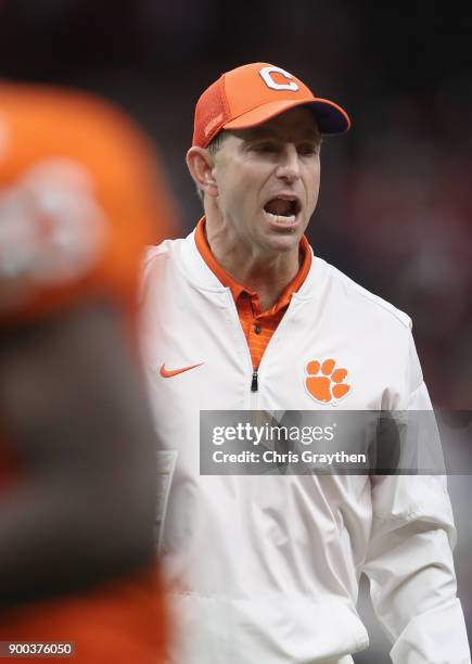 Head coach Dabo Swinney of the Clemson Tigers react in the first half of the AllState Sugar Bowl against the Alabama Crimson Tide at the...