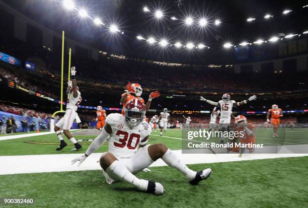 Mack Wilson of the Alabama Crimson Tide scores a touchdown on an interception in the second half of the AllState Sugar Bowl against the Clemson...