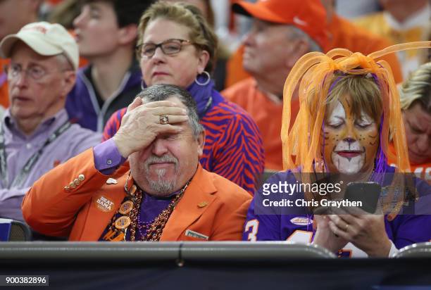 Clemson Tigers fans react in the second half of the AllState Sugar Bowl against the Alabama Crimson Tide at the Mercedes-Benz Superdome on January 1,...