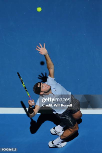 Jack Sock of the United States serves to Yuichi Sugita of Japan in the mens singles match on Day Four of the 2018 Hopman Cup at Perth Arena on...