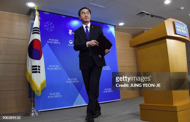 South Korea's Unification Minister Cho Myoung-Gyon leaves after a press conference at a government complex in Seoul on January 2, 2018. - South Korea...