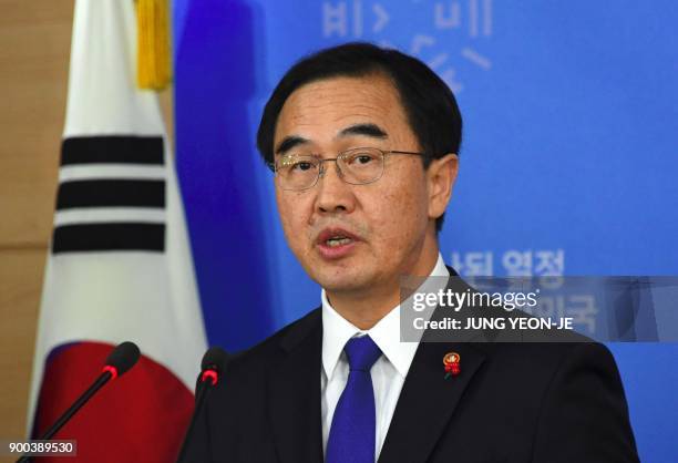 South Korea's Unification Minister Cho Myoung-Gyon speaks during a press conference at a government complex in Seoul on January 2, 2018. - South...