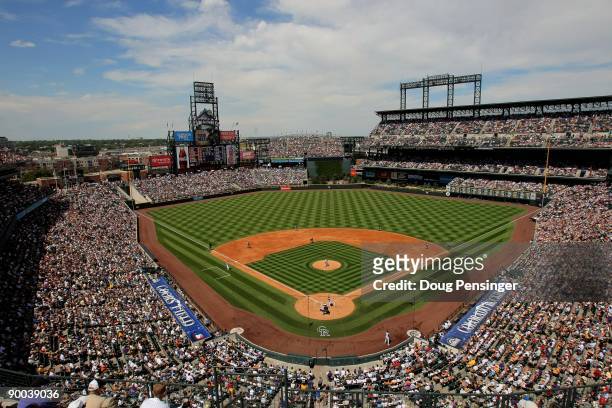 Fans pack the stadium as the San Francisco Giants face the Colorado Rockies at Coors Field on August 23, 2009 in Denver, Colorado. The Rockies...